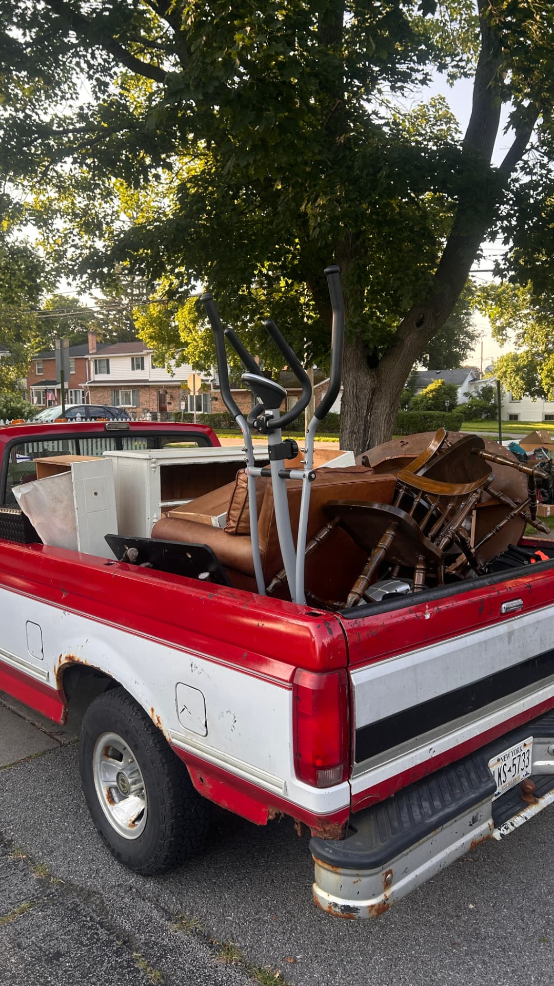 Truck loaded with furniture and household junk